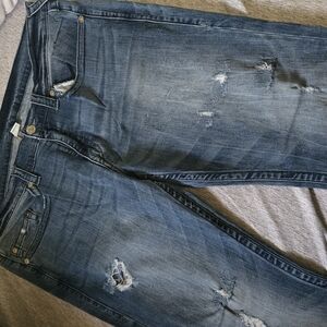 Distressed Blue Denim Jeans